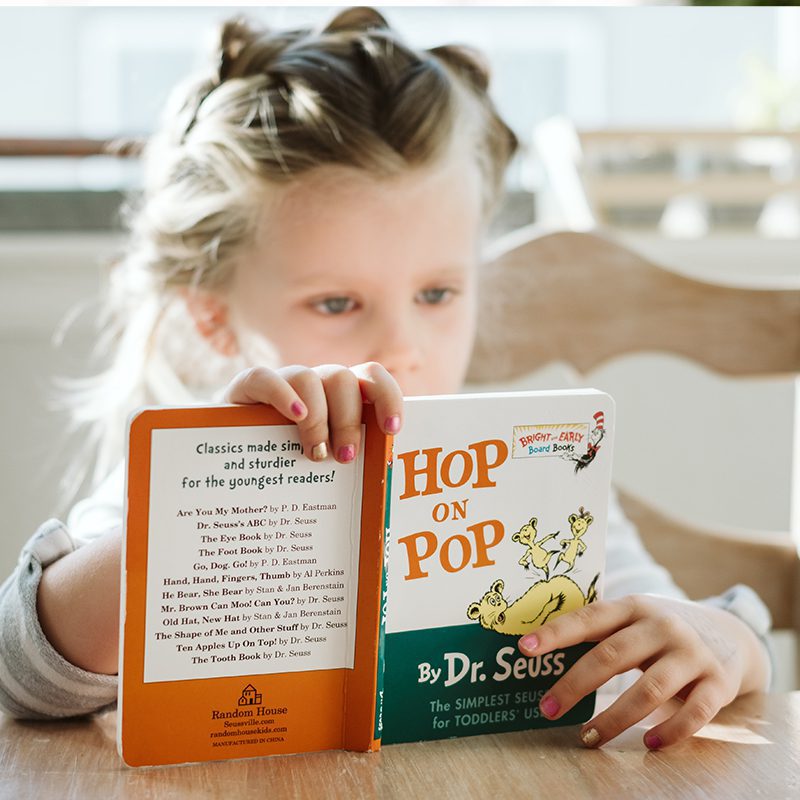 child reading hop on pop