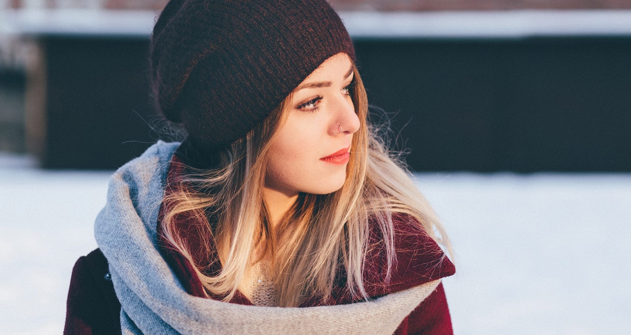 woman bundled up in the snow